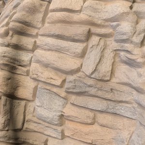 Stone wall on curved geometry.
